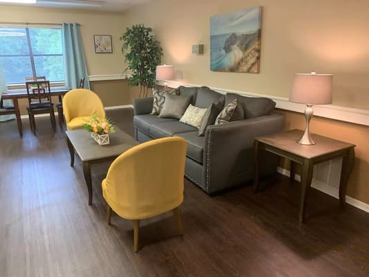Living room with comfortable seating and natural light