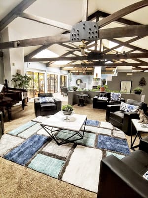 Cozy common area with seating and plants