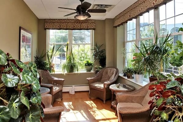 Bright common area with plants and seating