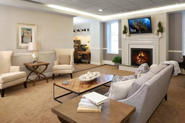 Cozy common area with comfortable seating and fireplace