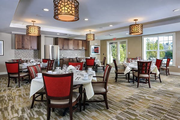Dining room with tables set for meals