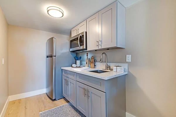 Modern kitchenette in a resident's unit