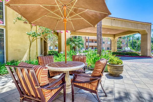 Outdoor patio seating area with umbrella