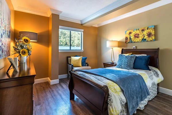 Cozy bedroom with floral accents and natural light