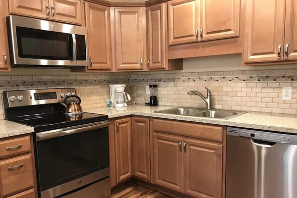Modern kitchen with stainless steel appliances