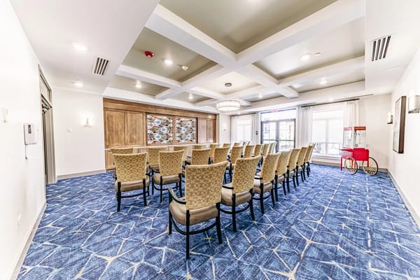 Spacious common area with chairs arranged for an event
