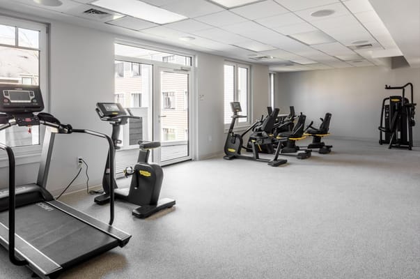 Fitness center with exercise equipment at NewBridge on the Charles