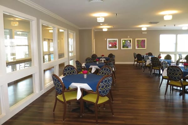 Interior dining room setup with tables and chairs