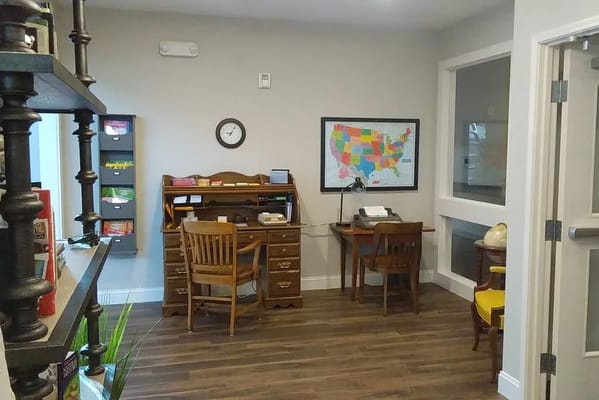 Interior view of a reception area with desks