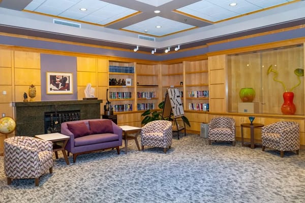 Interior view of a cozy common area with seating