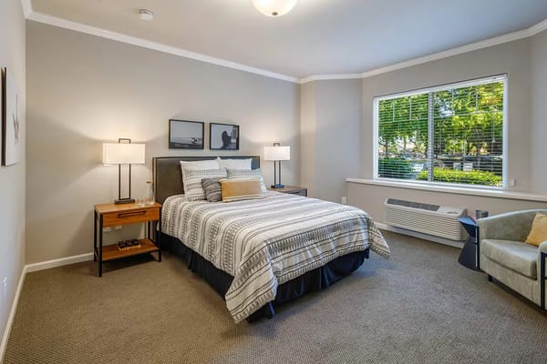 Cozy private resident room with a bed and window