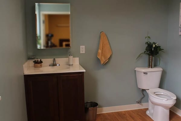 A clean, well-lit bathroom in a senior living facility