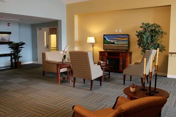 Bright common area with seating and decor