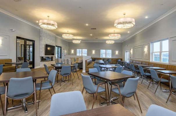 Bright dining area with modern furniture and lighting
