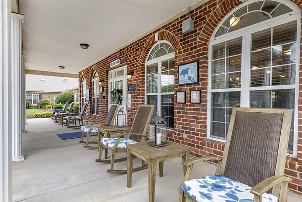 Welcoming outdoor seating area in front of the facility