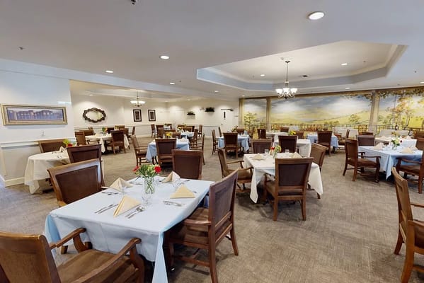 Dining area with tables set for meals