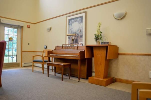 Interior view of a piano and seating area