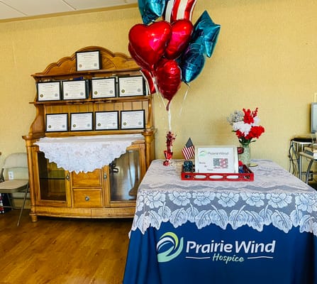 Facility logo display with awards and decorations