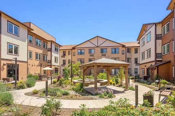 Outdoor courtyard with a gazebo and landscaping