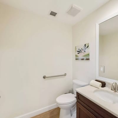 Bright and clean bathroom with a shower and sink