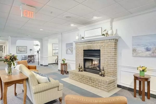 Cozy common area with a fireplace and seating