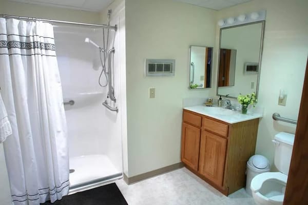 Clean and modern bathroom with shower and sink