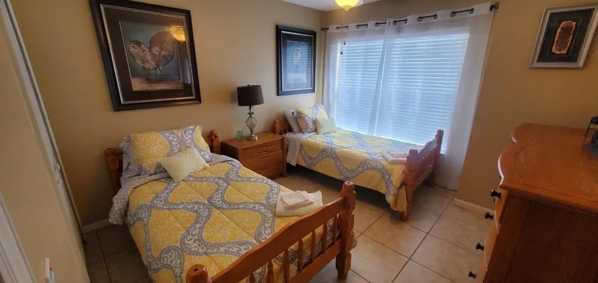 Interior view of a shared resident bedroom with two beds
