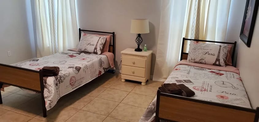 A neatly arranged double bedroom in the facility