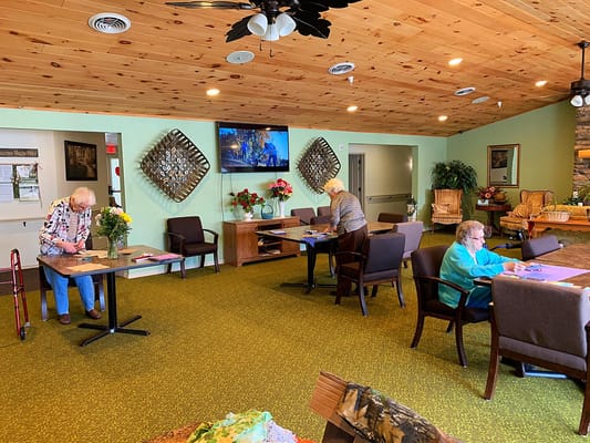 Residents engaged in activities in a common area