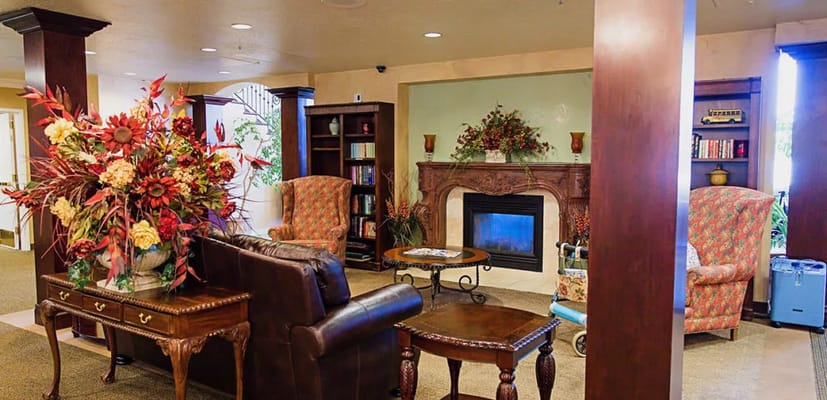 Cozy interior lounge area with floral arrangements