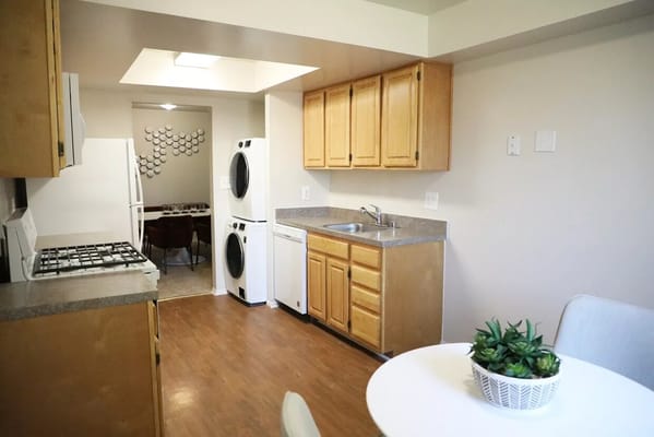 Bright kitchen with appliances and dining table