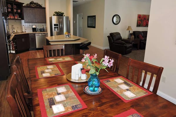 Interior dining area with a wooden table and chairs