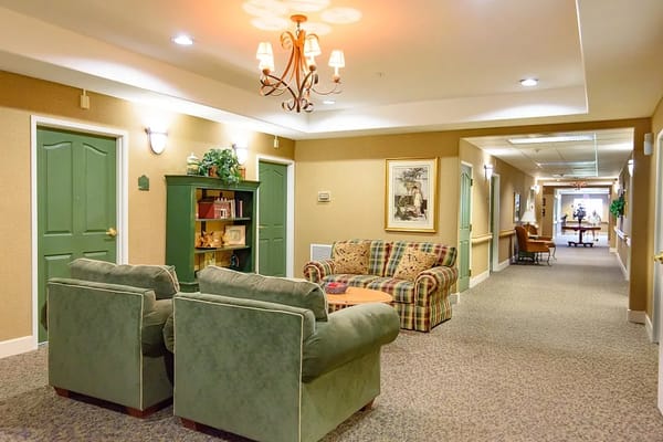 Interior hallway with seating area and decor