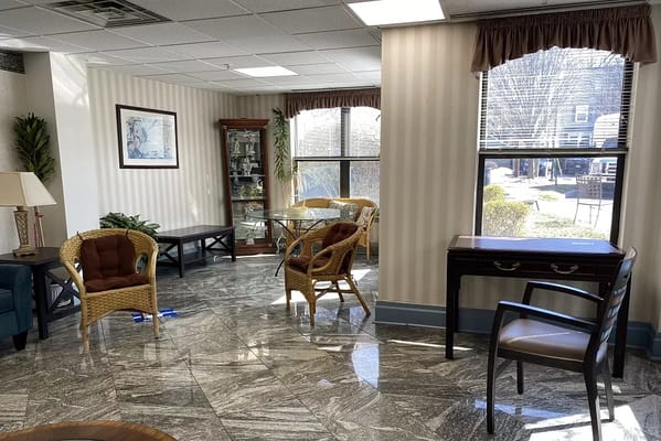 A cozy common area with seating and natural light