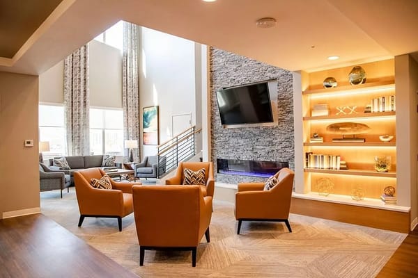 Interior view of a cozy common area with seating