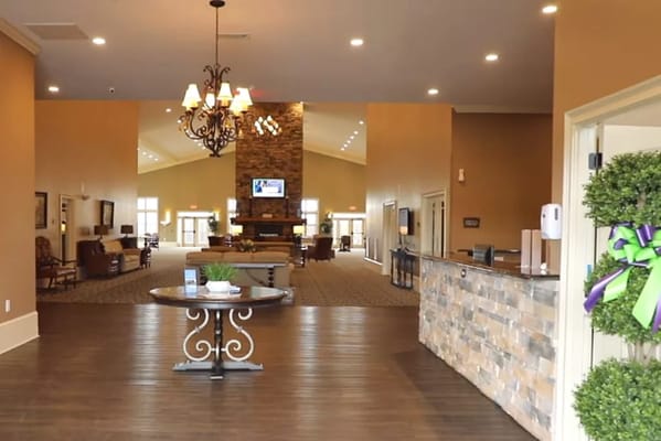 Spacious lobby area with comfortable seating and reception desk