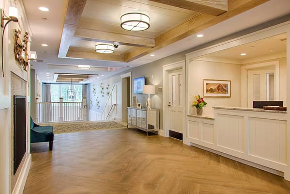 Bright and spacious lobby with seating and reception desk