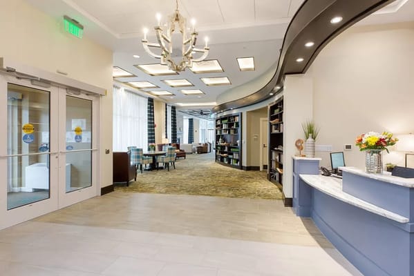 Interior view of the lobby with seating and reception area