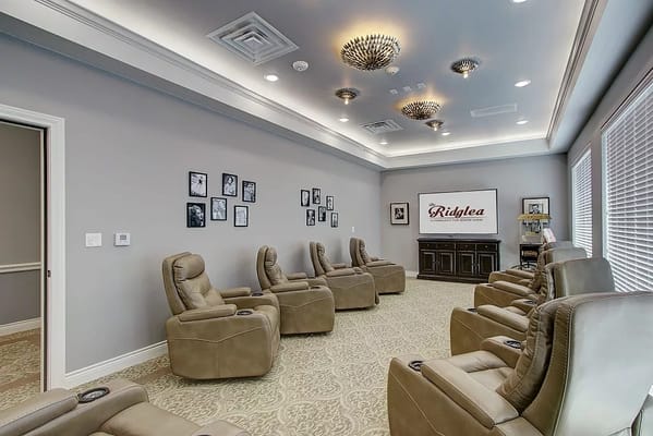Comfortable lounge area with reclining chairs at The Ridgelea Senior Living