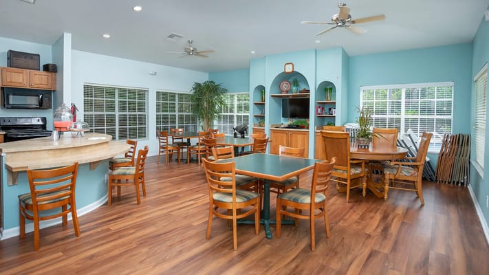 Bright interior common area with tables and chairs