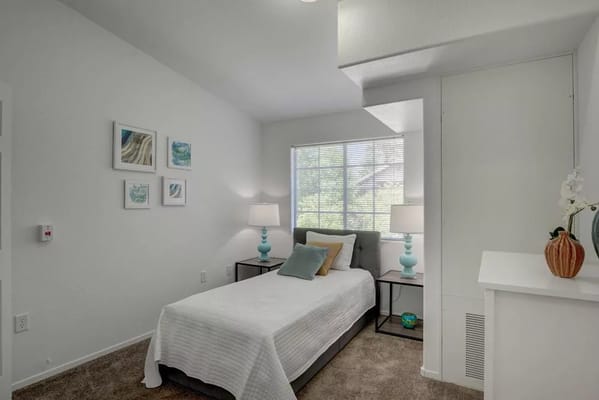 Cozy resident room with bed and decor