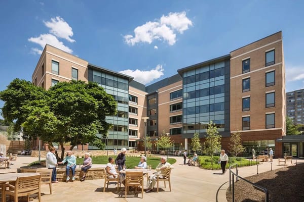 Residents enjoying the outdoor space in a courtyard
