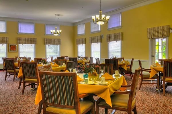 Dining room with tables set for a meal