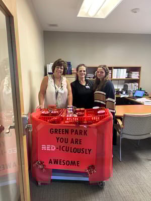 Staff members celebrating with decorations in an office
