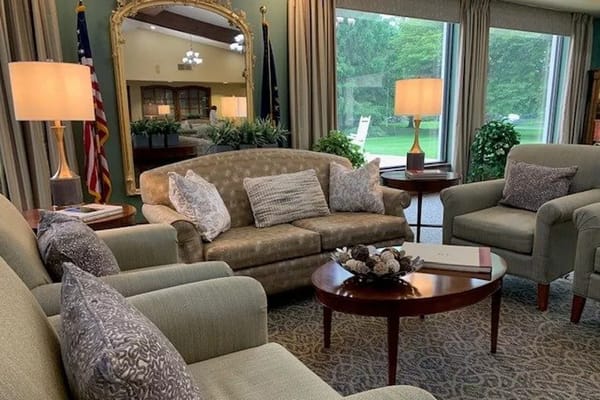 Cozy seating area in a common room with natural light