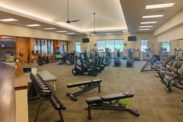 Interior view of a fitness area with exercise equipment