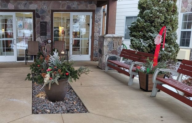 Exterior view of Wildwood Grove entrance decorated for holidays