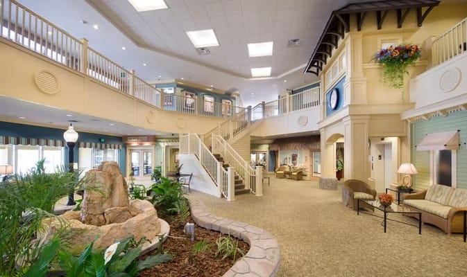 Elegant interior lobby with staircase and plants