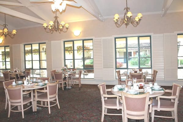 Dining room with tables set for meals