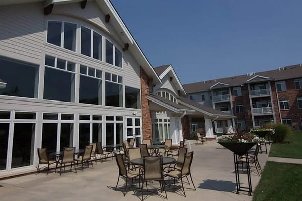Spacious outdoor patio with seating at Woodlands Creek